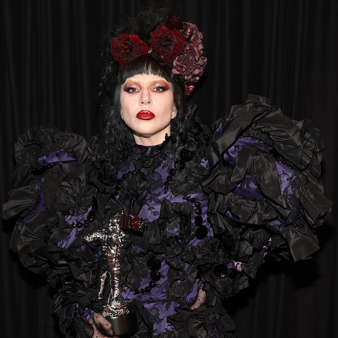 Lady Gaga poses with the “Artist of the Year” award during the 2025 MTV Video Music Awards